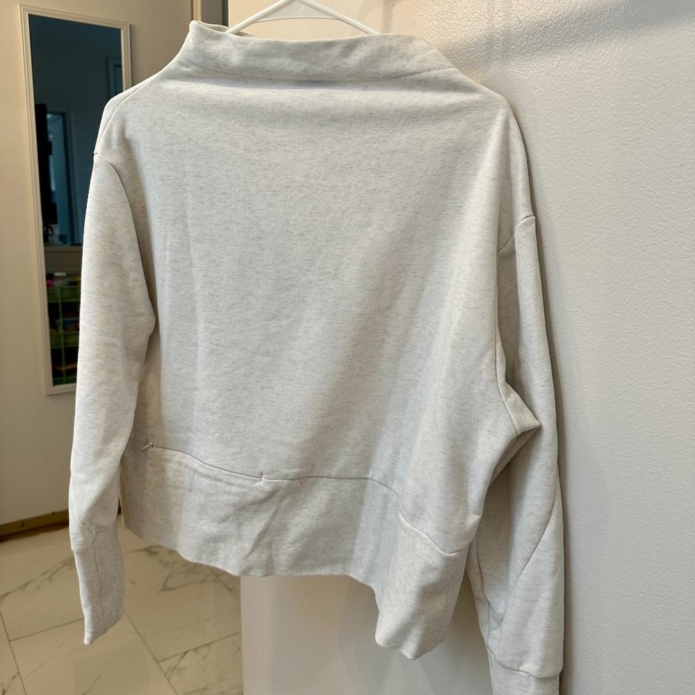 Nike Dri-Fit Versa Studio Mock Neck Sweatshirt in Oat Heather